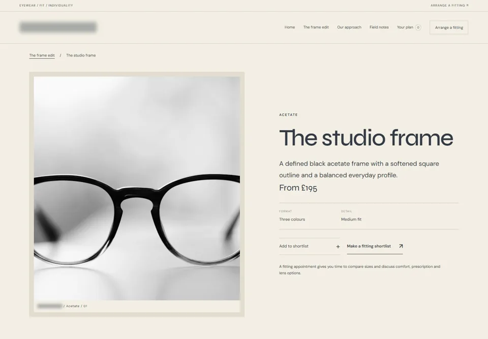 The studio frame — identifying labels masked